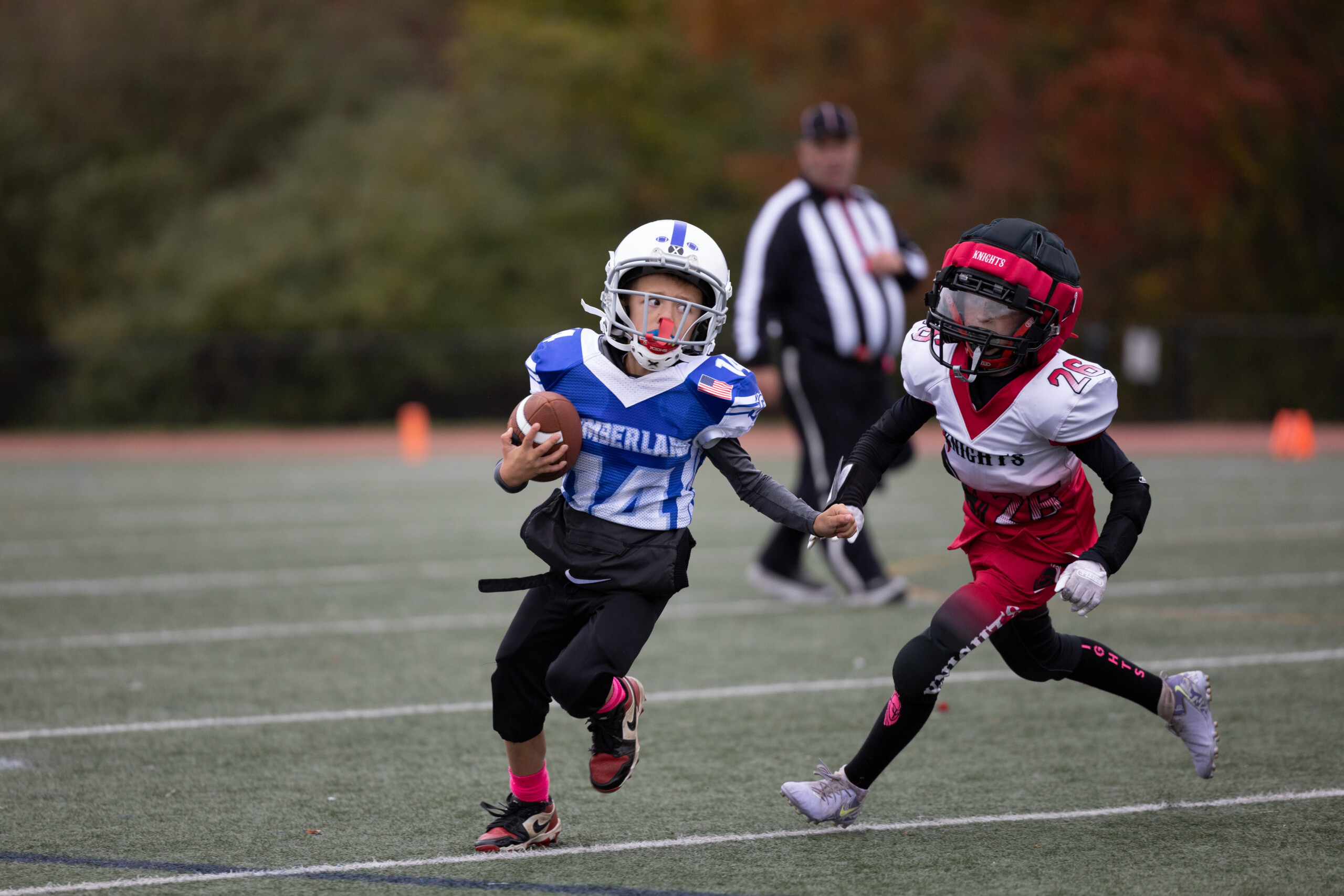 Football Player avoiding a tackle